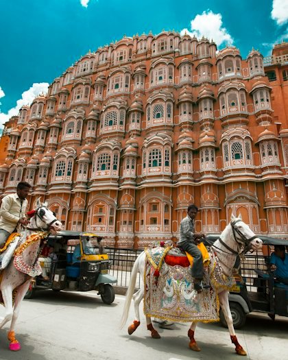 The pink sandstone facade of Hawa Mahal in Jaipur, Rajasthan