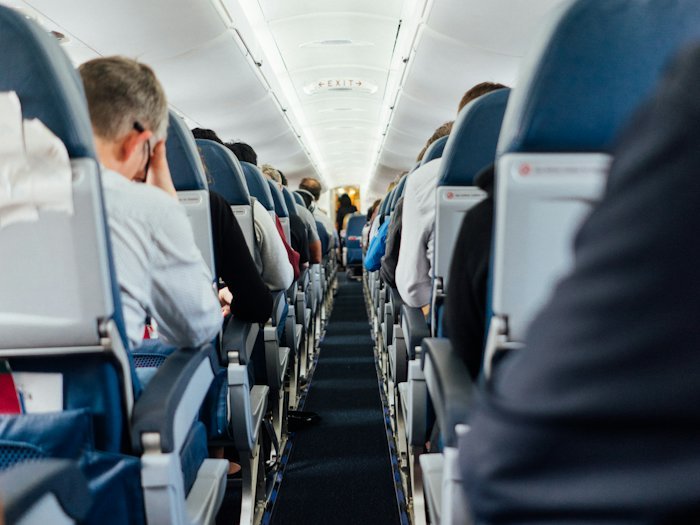 The cabin aisle of an aircraft on a long-haul flight