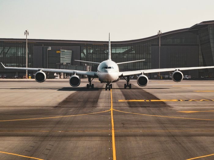 An aircraft lined up on the runway ready for departure