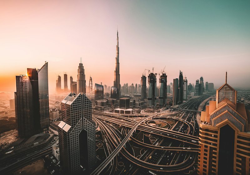 Dubai skyline with the Burj Khalifa rising above the city at dusk